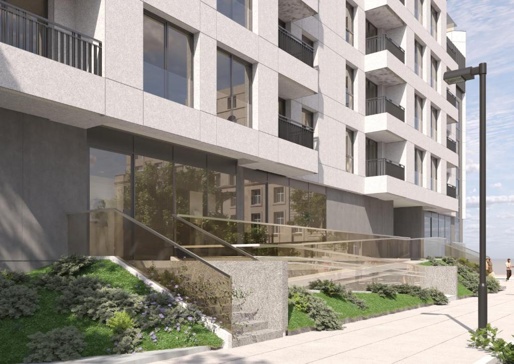 an external view of a building with a garden at Apartbaltic- Ventus Park 5 in Świnoujście
