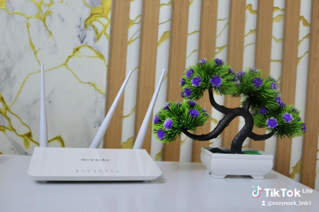 a small bonsai tree sitting on top of a table at Purity homes ruiru in Ruiru