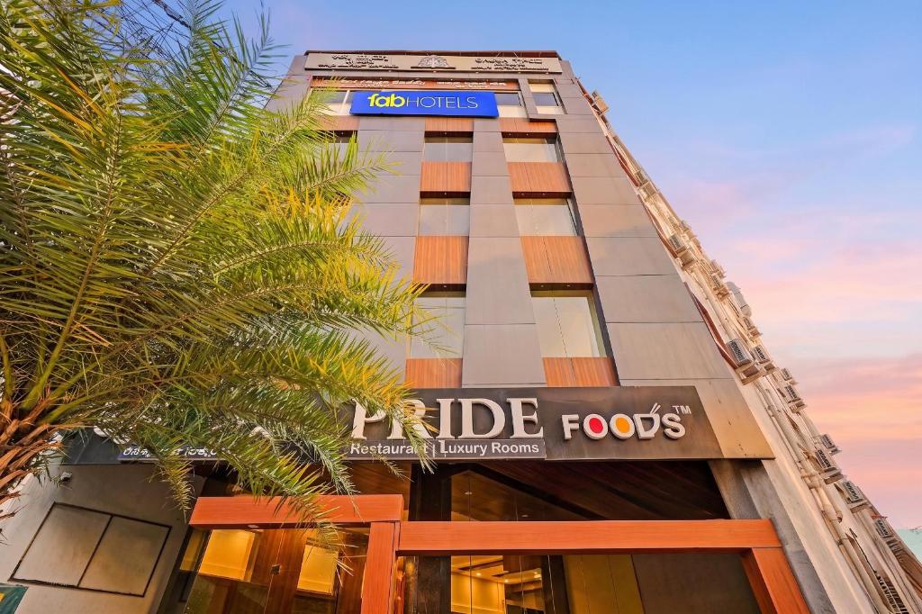 a building with a sign that reads reliable foods at FabHotel Pride - Electronic City in Bangalore