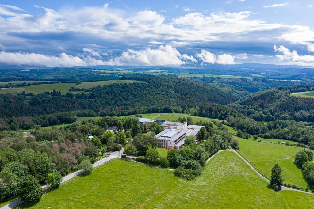 an aerial view of a large house on a green field at Shree Peetha Nilaya - Hindu Ashram in Springen