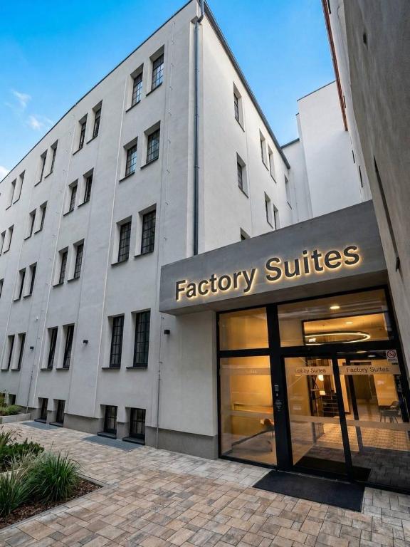 a store front of a factory suites building at Factory Suites in Prague