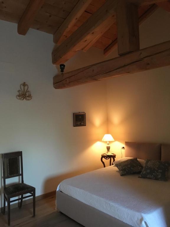 Postel nebo postele na pokoji v ubytování Borgo Palazzo Steffaneo