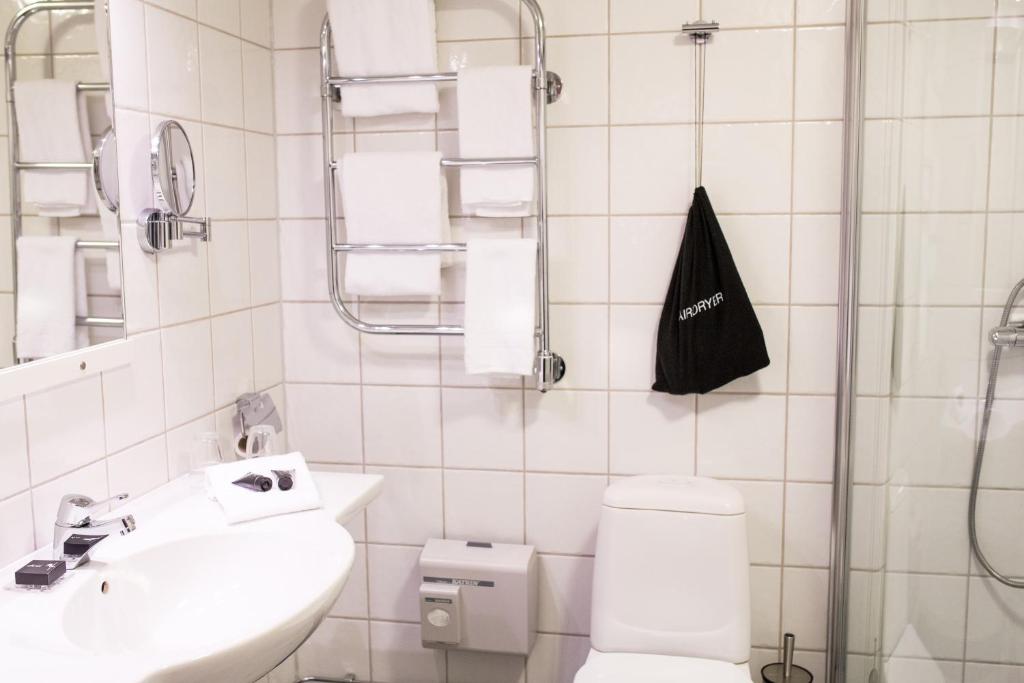 Koupelna v ubytování ProfilHotels Savoy