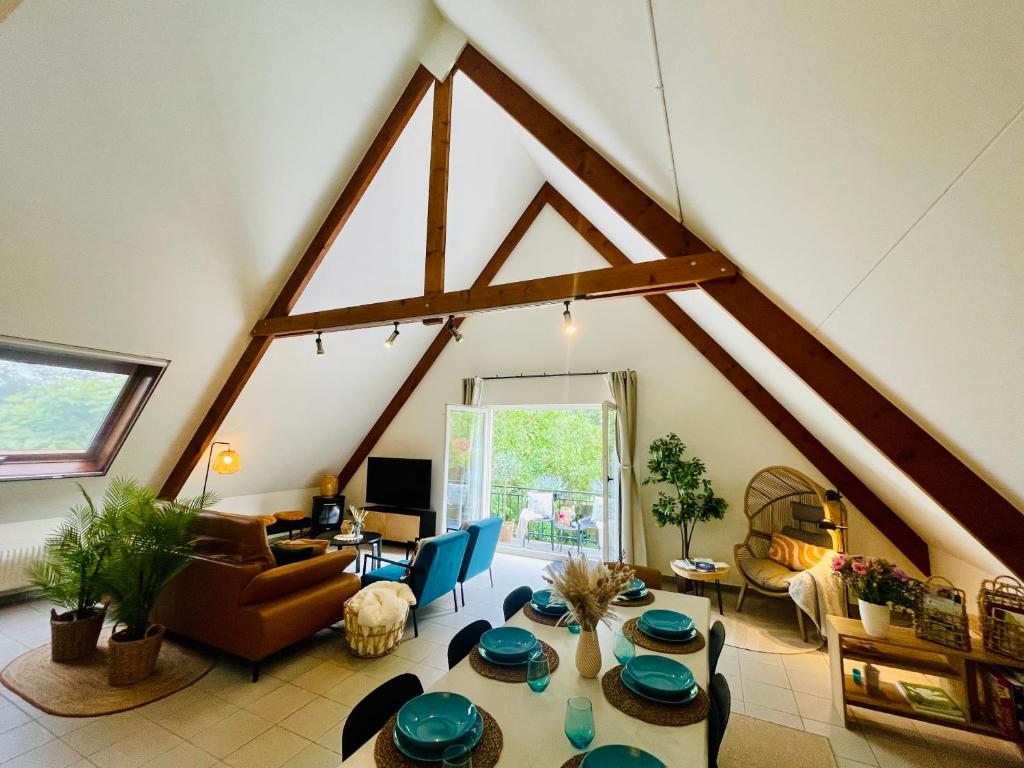 a large living room with a large roof at Villa Everbeur te Averbode in Scherpenheuvel-Zichem