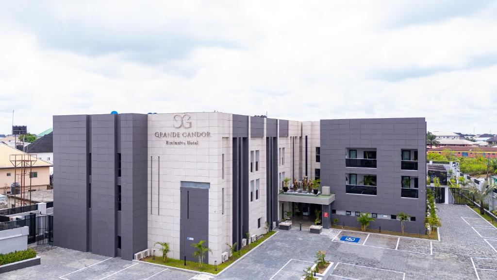 an image of the front of a building at Grande Candor Exclusive Hotel in Warri Airport
