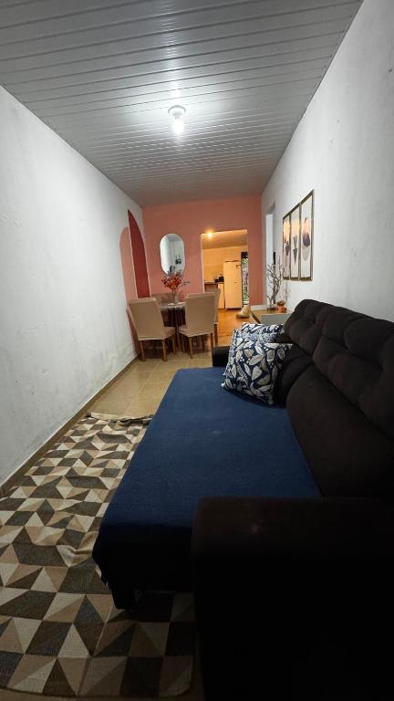 a living room with a couch and a table at Raízes do Sertão - Vale do Catimbau in Buíque