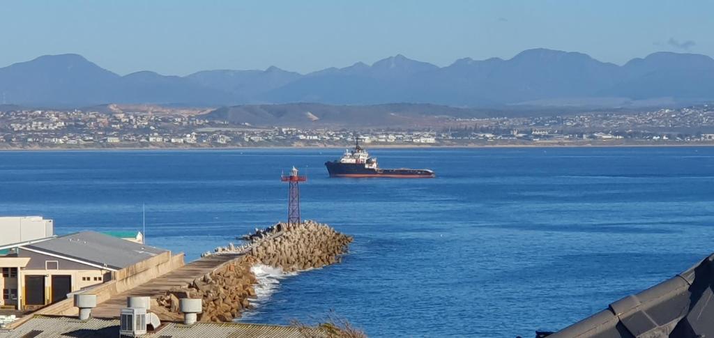 a large ship in a large body of water at 7 on Kloof in Mossel Bay