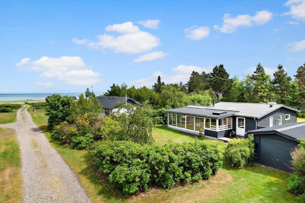 an aerial view of a house with a driveway at OH593-Hadsund-Halvrebene-124 in Hadsund