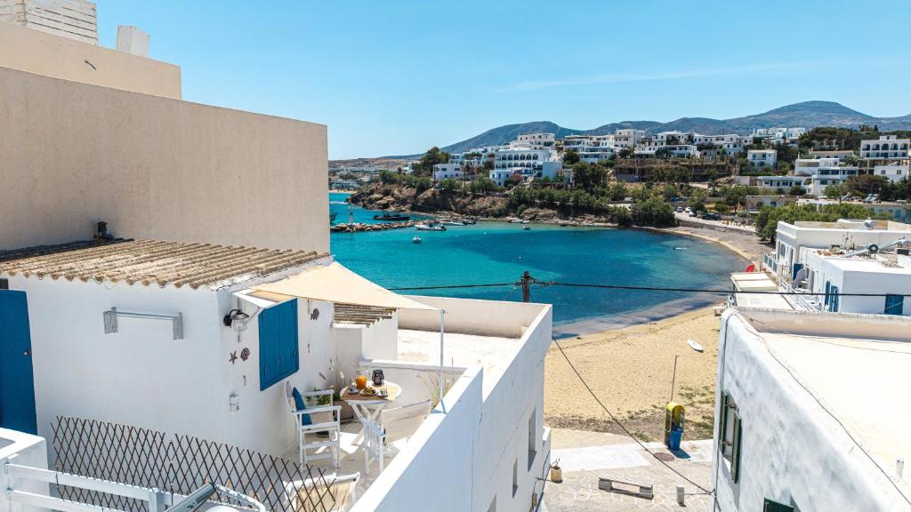 a view of a beach from a building at Tzivaeriparos studio in Piso Livadi