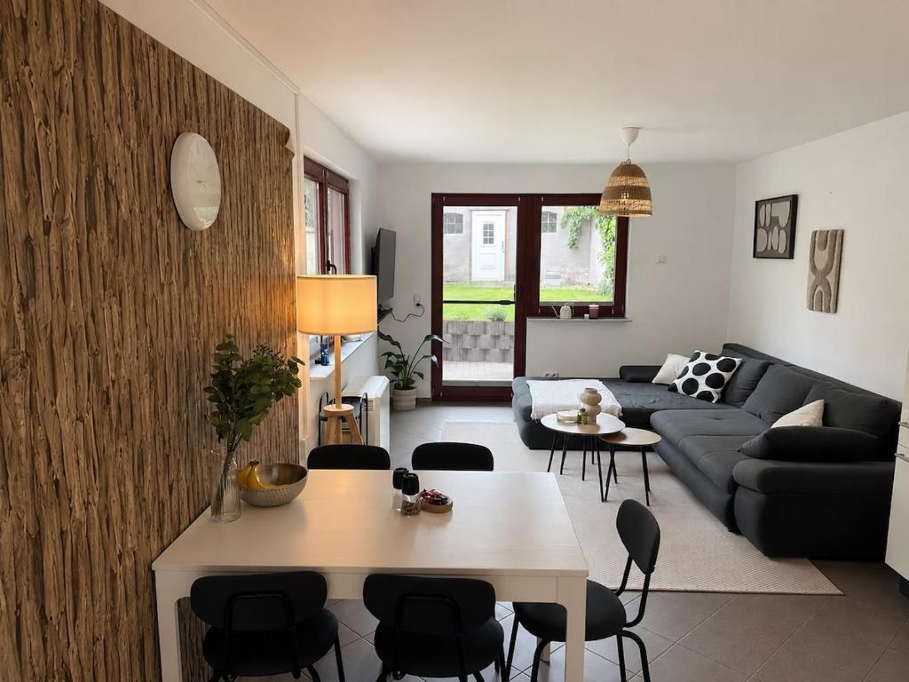 a living room with a couch and a table at Ferienwohnung am Bodden in Barth