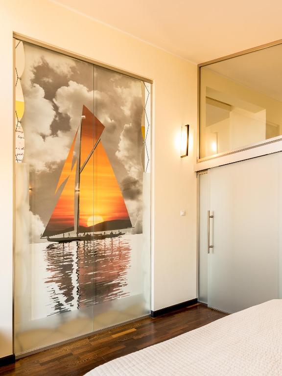 Postel nebo postele na pokoji v ubytování Sopocki Dwór Apartments