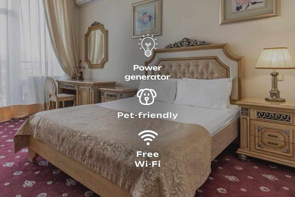 a hotel room with a bed with two stickers on it at Sonata Hotel in Kyiv