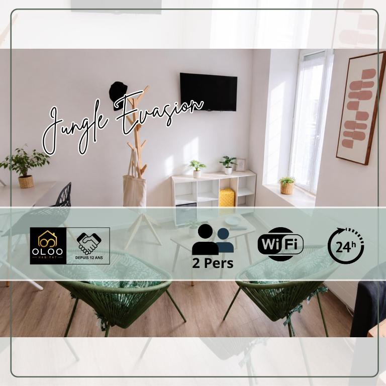 a glass table in a room with a tv at OLOO Habitat - Le 3 in Lure