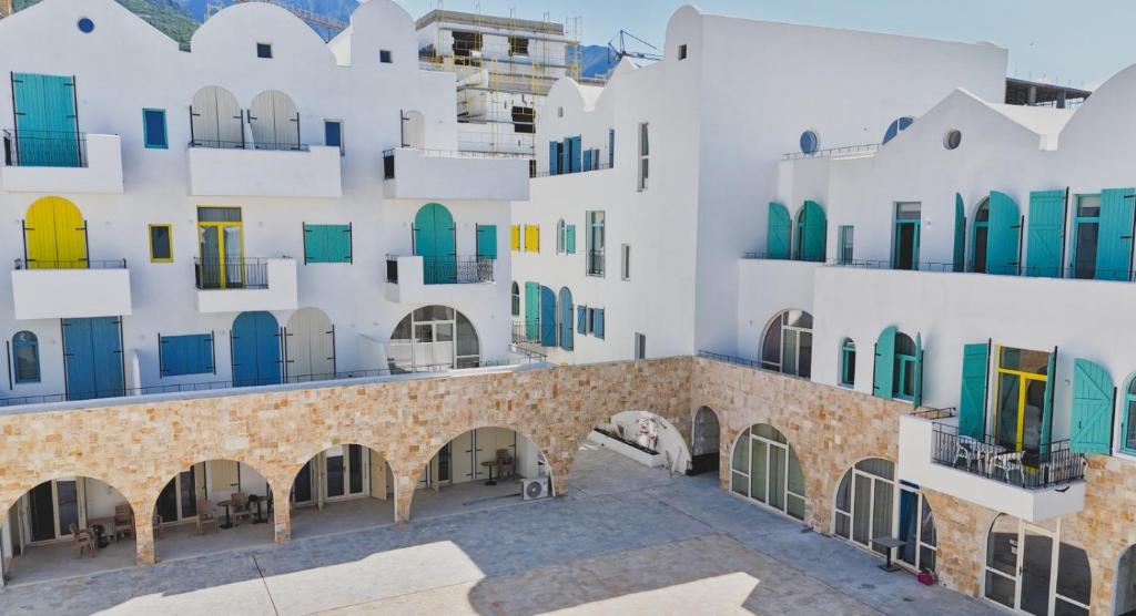 an aerial view of a building with colorful windows at Southern Nights in Gjilek