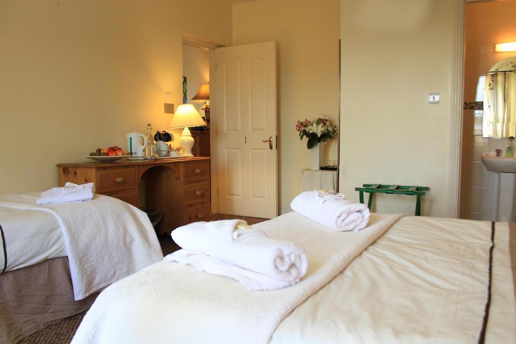 Postel nebo postele na pokoji v ubytování Parkhouse B&B