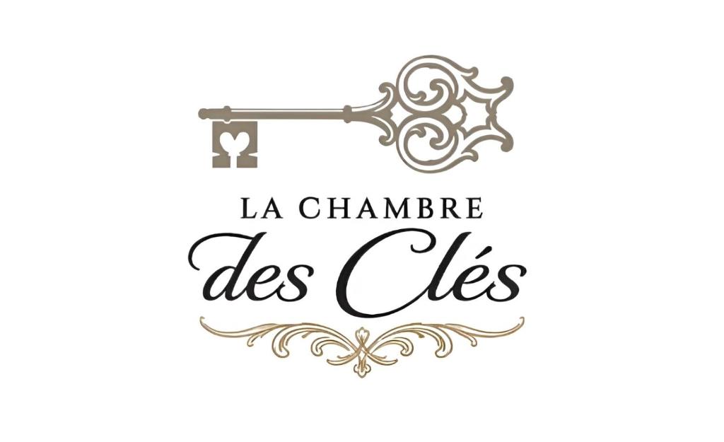 a vector illustration of a vintage key with the text la chanbara dies dies at La chambre des clefs in Ranville