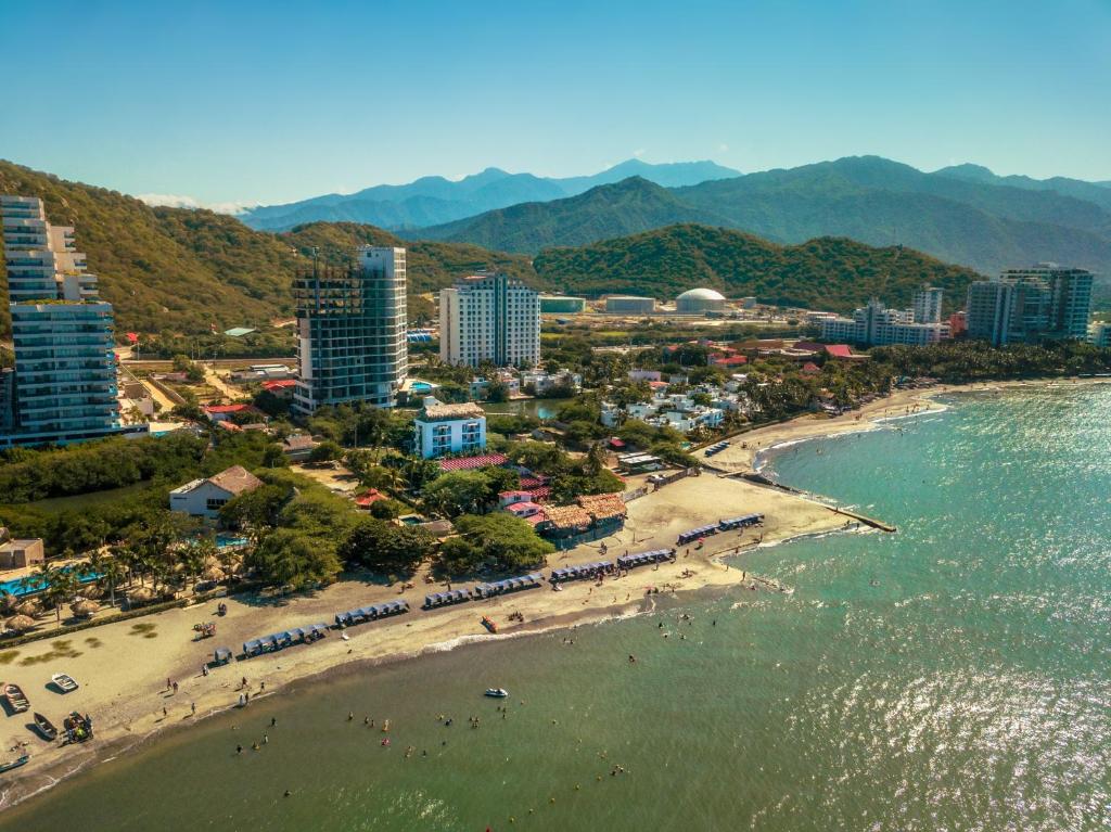 an aerial view of a beach and the ocean at TAMA Hotel Santa Marta in Santa Marta