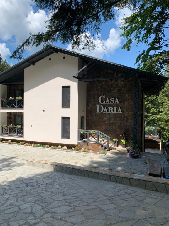 a building with the words casa daria on it at Casa Daria in Durău