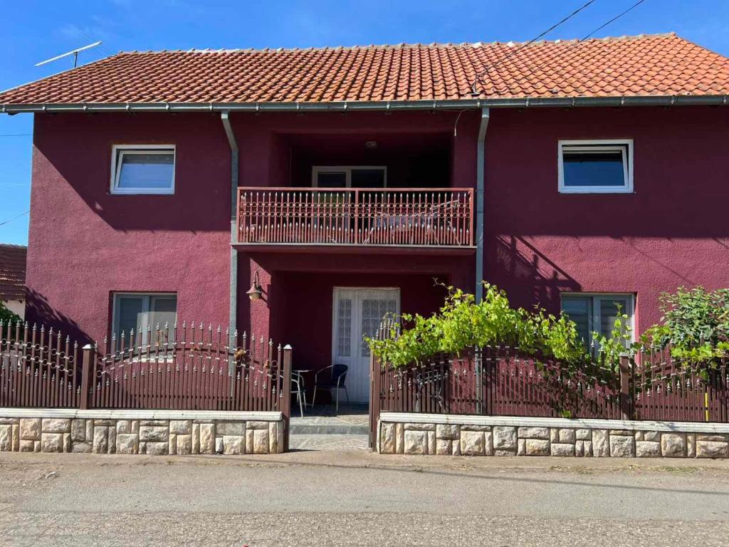 a red house with a red roof at Amos 1 in Paraćin
