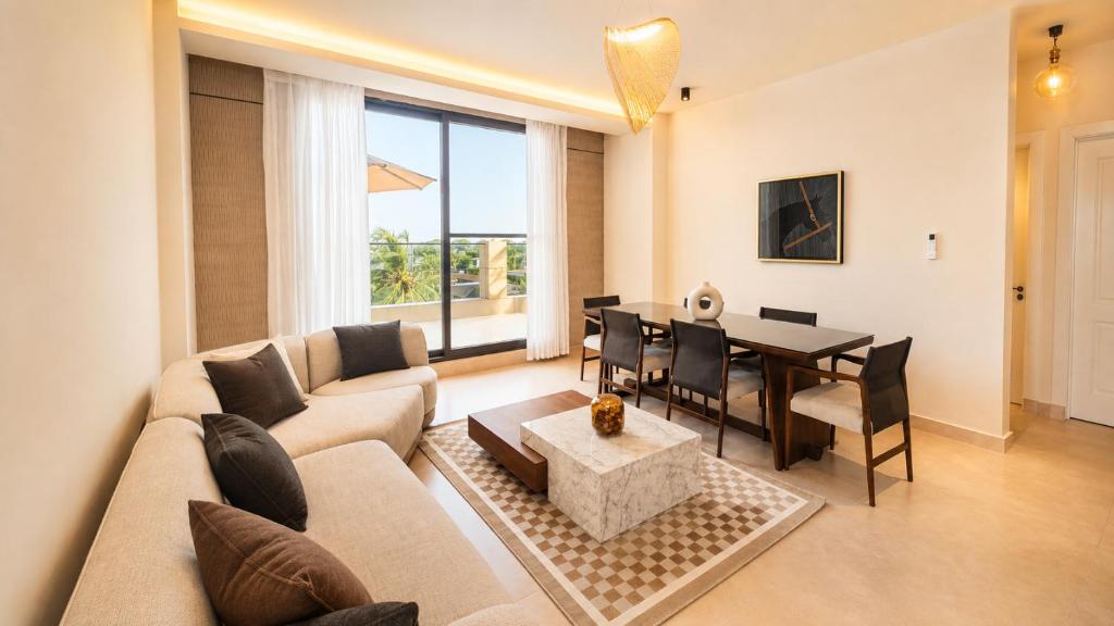 a living room with a couch and a table at Elite Residence in Accra