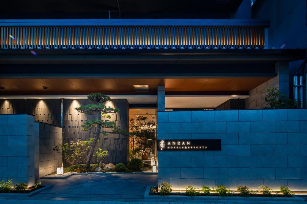 a facade of a building at night at Anran Hotels&Resorts in Osaka