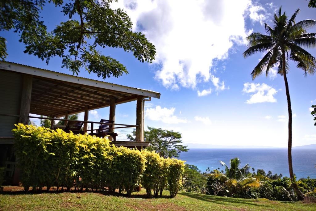 a house with a view of the ocean at Maravu Taveuni Lodge in Matei