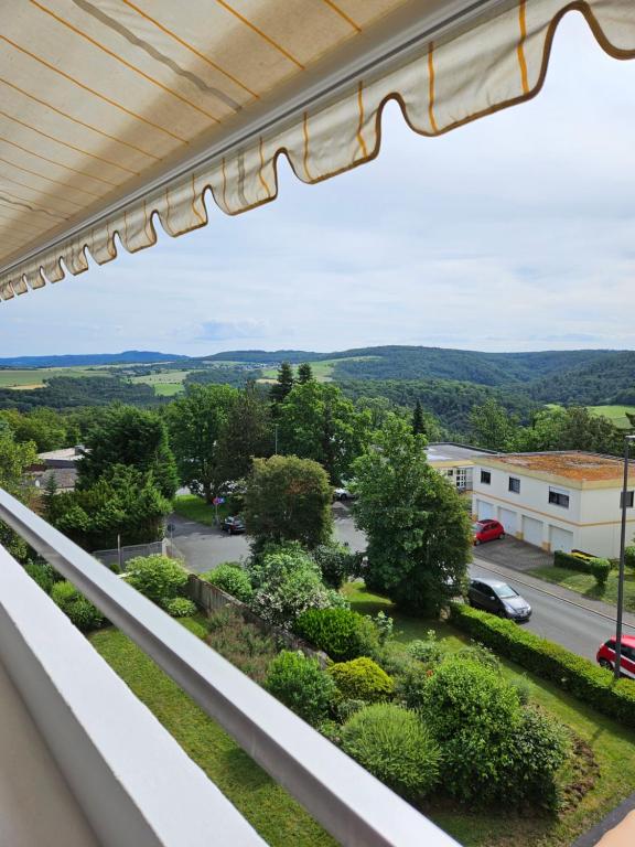 a balcony with a view of a parking lot at Apartment 416 mit Pool in Lahnstein