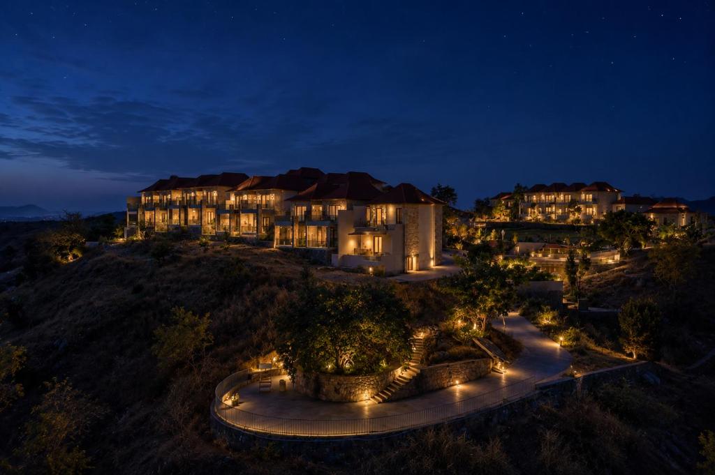an aerial view of a building at night at Sajjan Bagh Resort Kumbhalgarh in Kumbhalgarh