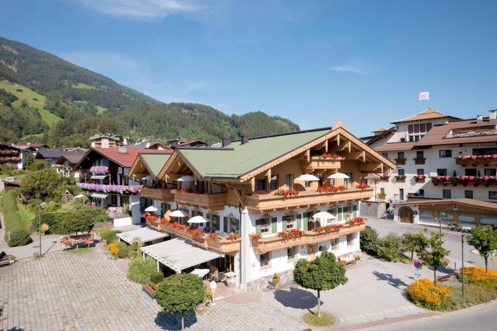 an aerial view of a building in a town at Das Krumerhaus in Aschau