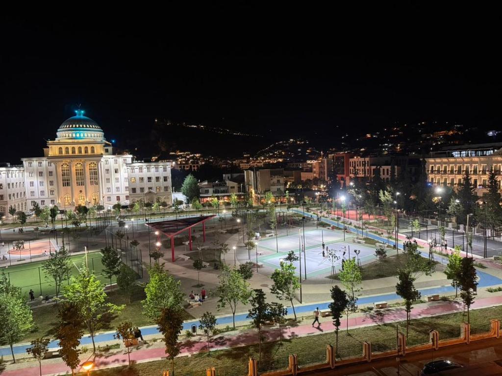 a view of a city at night at Berat Skyline Apartment in Berat