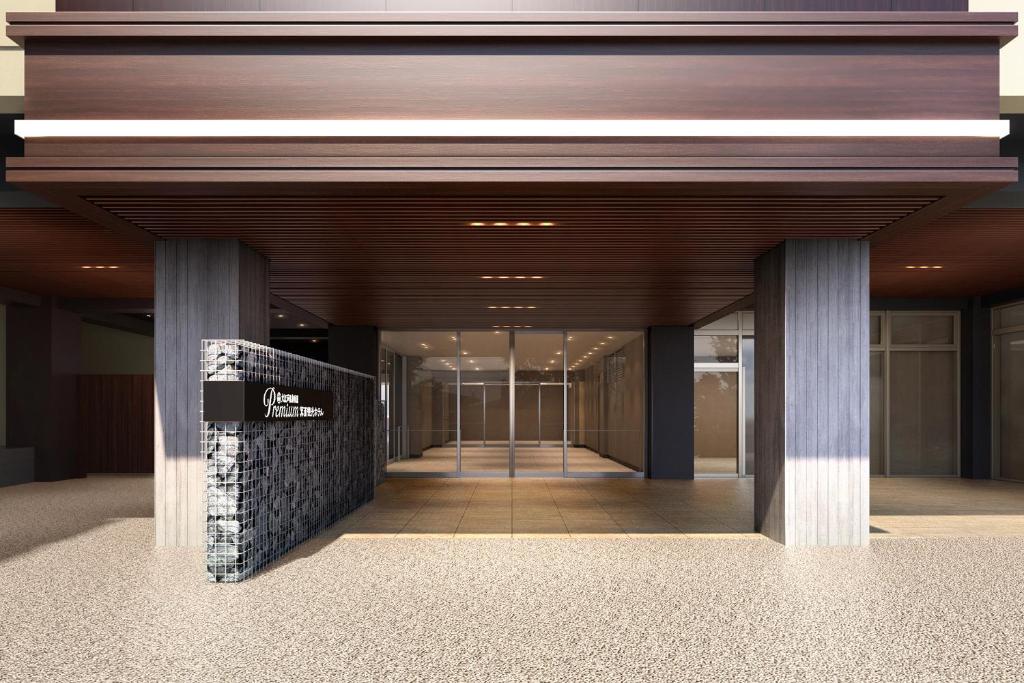 a lobby of a building with a wooden ceiling at Ooedo Onsen Monogatari Premium Minoh Kanko Hotel in Minoo