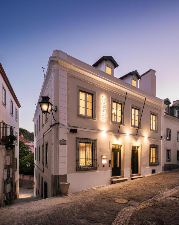 a white building with its lights on at Pendoa Sintra Collection-Soft Opening in Sintra