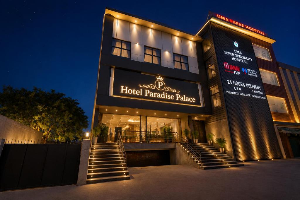 a hotel paradise palace with stairs in front of it at Hotel Paradise Palace in Ghaziabad