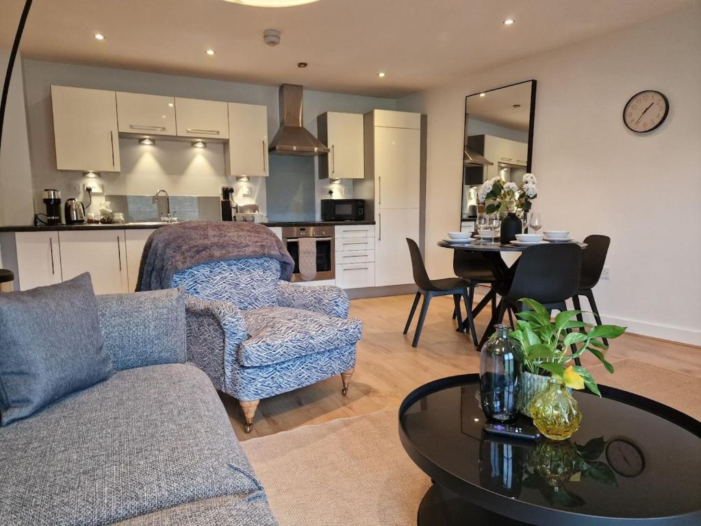 a living room with a couch and a table at Halton Hideaway in Halton