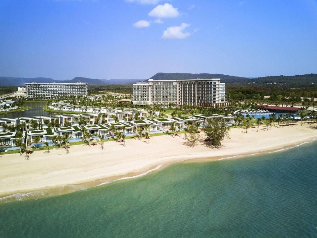 an aerial view of a resort on the beach at Mövenpick Villas & Residences Phu Quoc in Phú Quốc