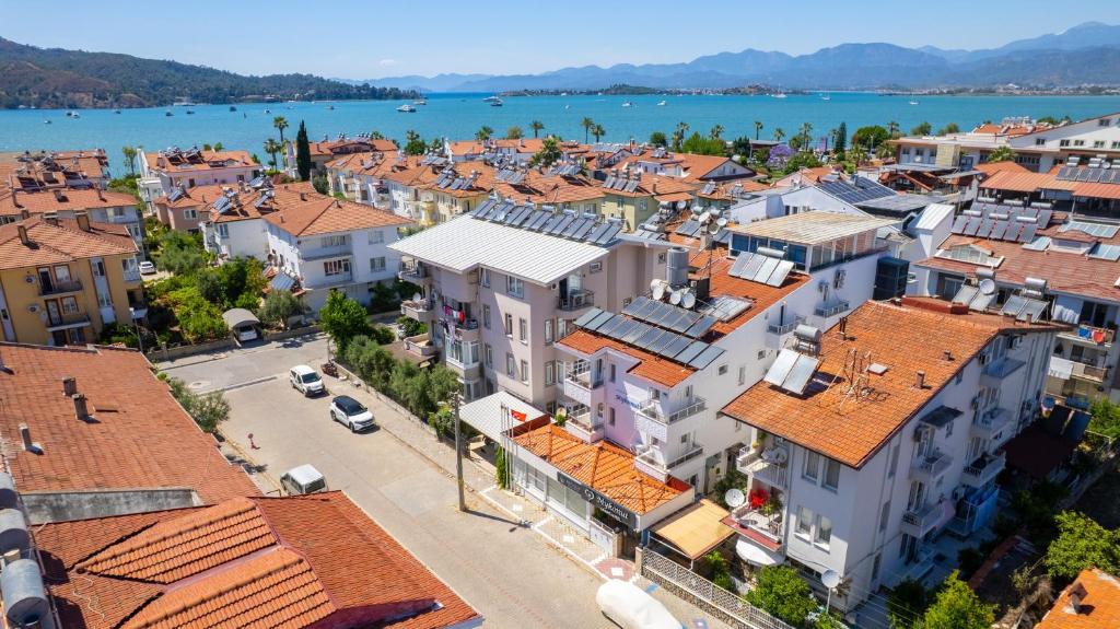 an aerial view of a town with orange roofs at Royalis Apart Hotel in Fethiye