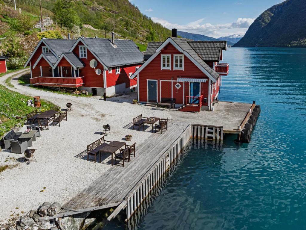 a house on the shore of a body of water at Apartment Vardeheii by Interhome in Arnefjord