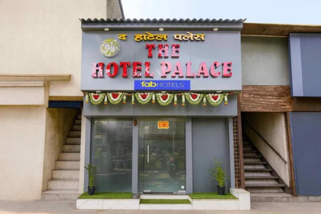 a hotel palace with a sign for the hotel palace at Via Palace Residence in Mumbai