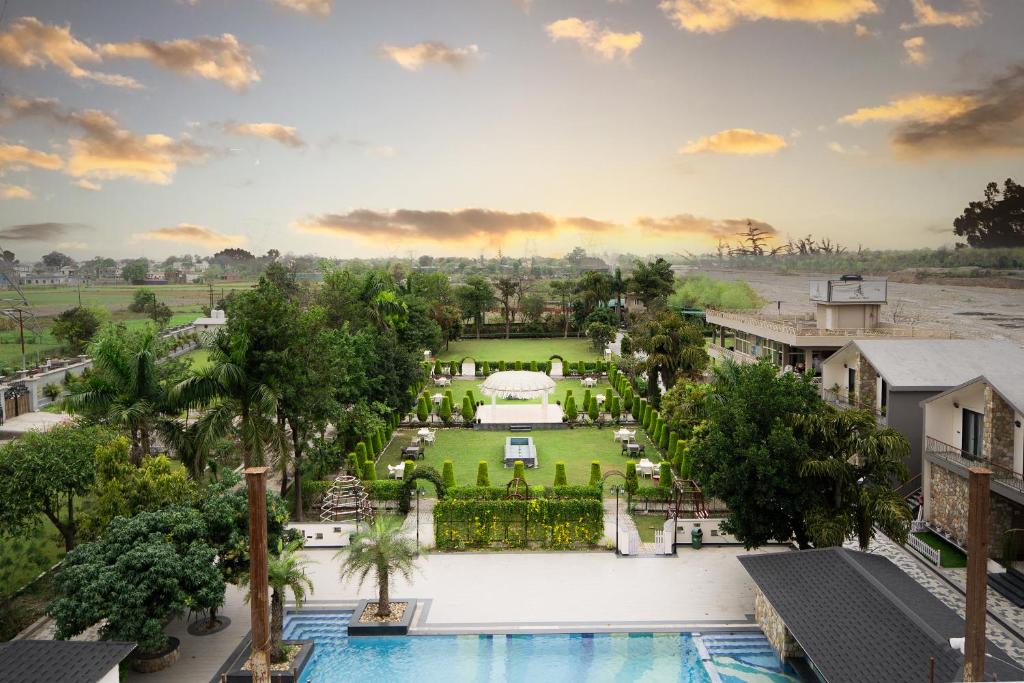 an aerial view of a resort with a pool and a garden at Justa Natures Nest Resort in Bullāwāla