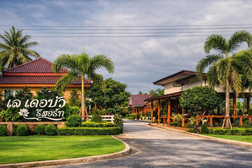 a resort with a sign that reads no hopkins sushi at Lay de Bua Resort in Phatthalung