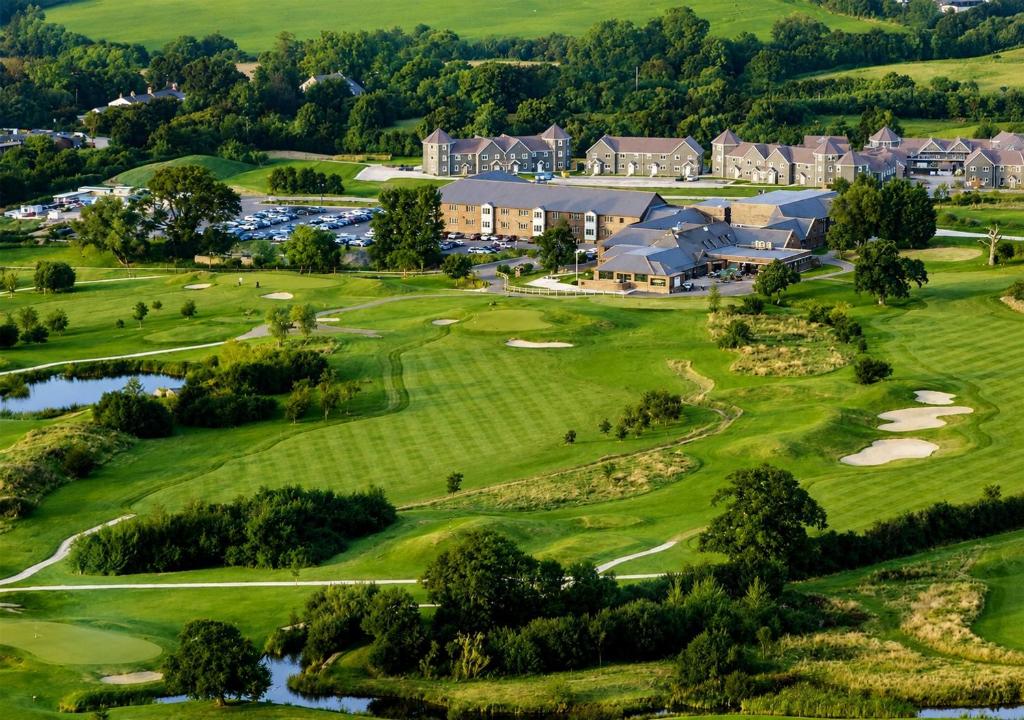 an aerial view of the golf course at a resort at The Wiltshire Hotel, Golf and Leisure Resort in Swindon