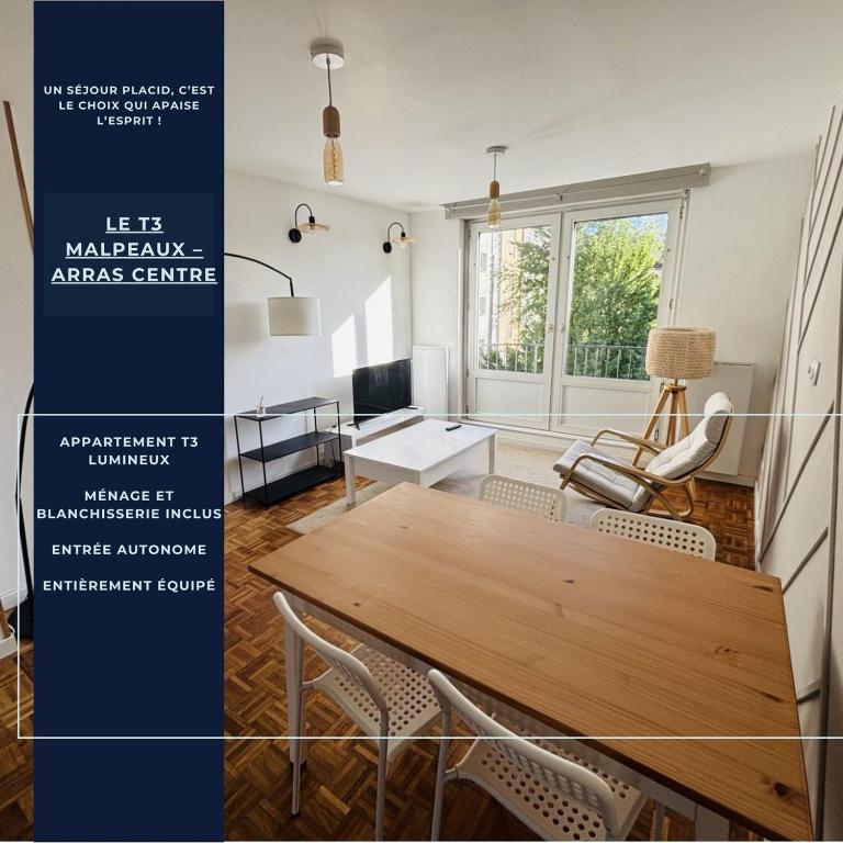a living room with a wooden table and chairs at Le T3 Malpeaux – Arras Centre in Arras