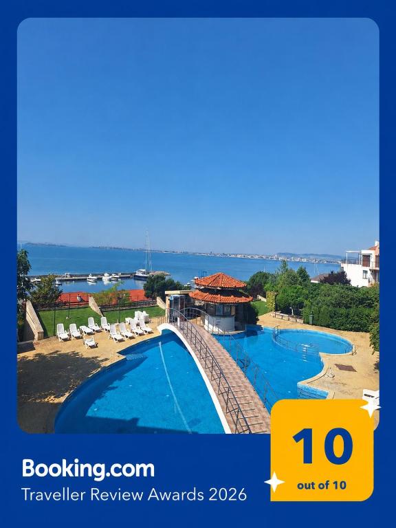 a picture of a pool with a view of the ocean at Diamond by the Sea in Sveti Vlas