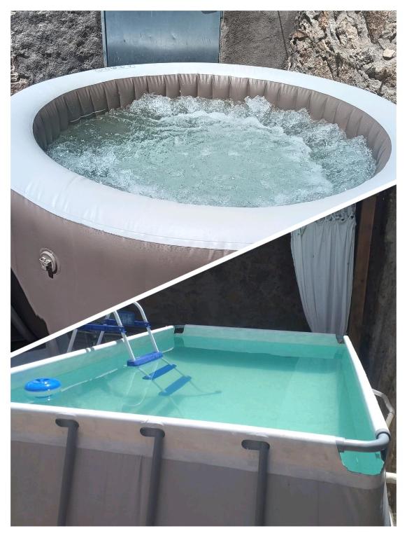 a bath tub filled with water and a pool of water at Don Mauricio y periquines in Robledillo
