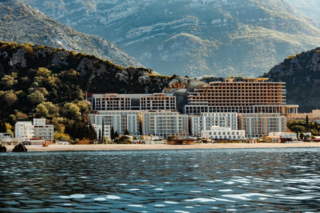 a view of a city from the water at Apartmani Grbović in Čanj