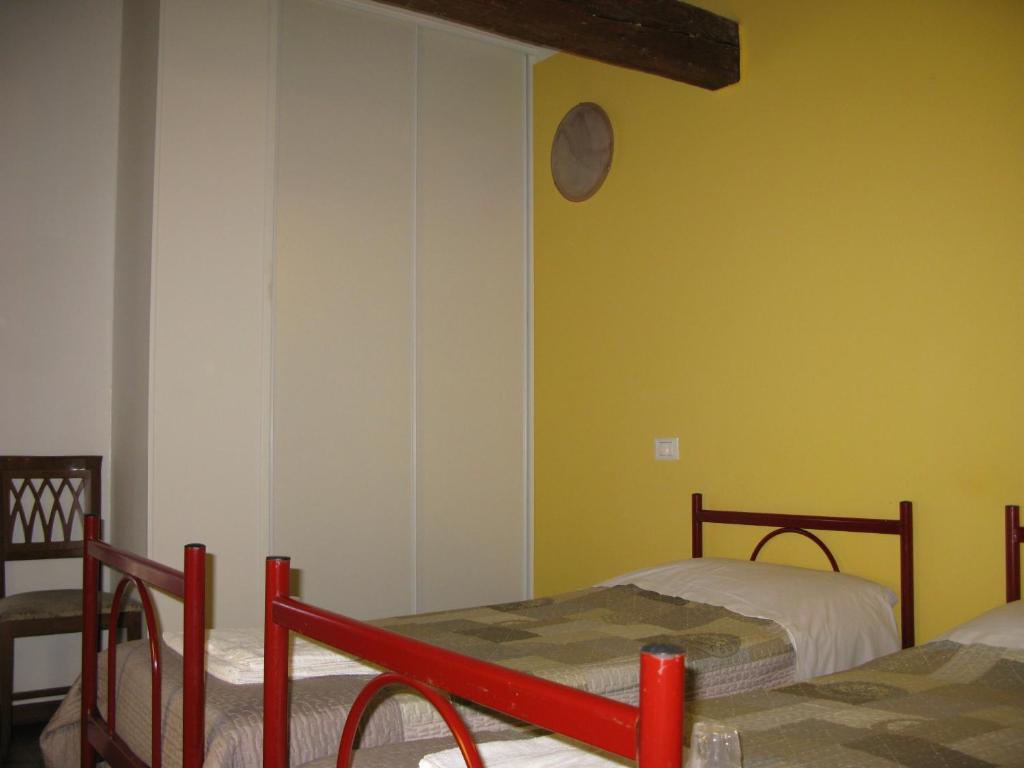 Postel nebo postele na pokoji v ubytování B&B Vaca Mora
