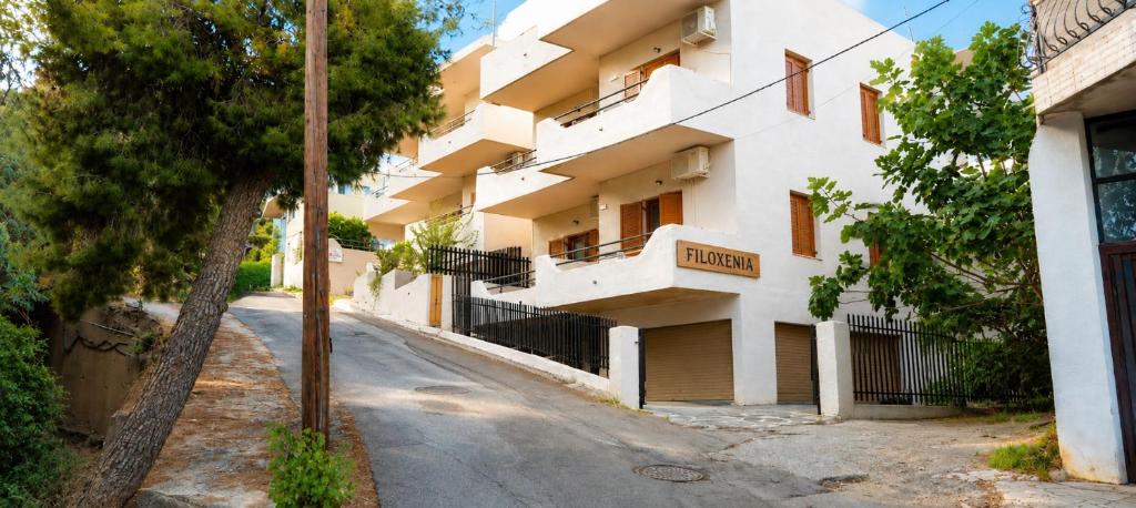 an empty street in front of a building at FILOXENIA by Evita's Resort in Poros