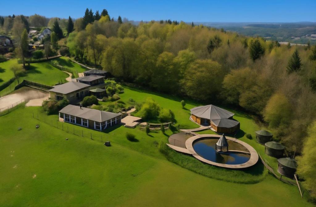 an aerial view of a large estate with a house at Gite équestre in Les Hogues