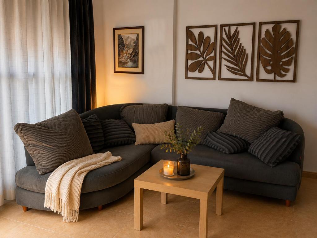 a living room with a couch and a table at Garbinada in Gandesa