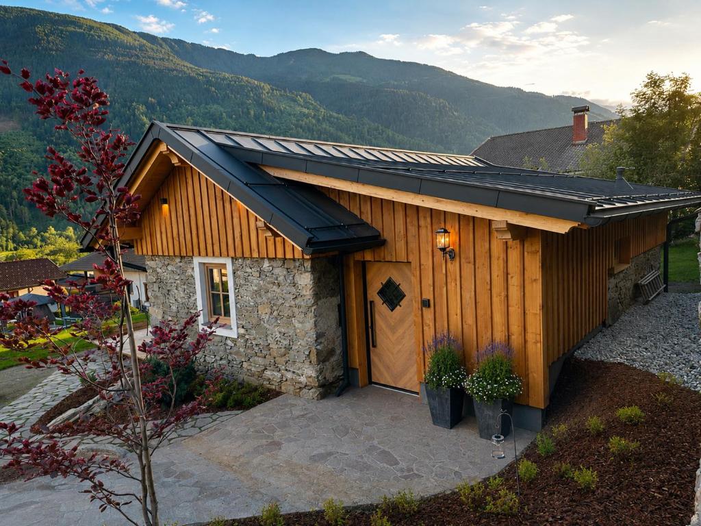 a building with a solar roof on top of it at Ferienhaus Steinschlössl in Mühldorf